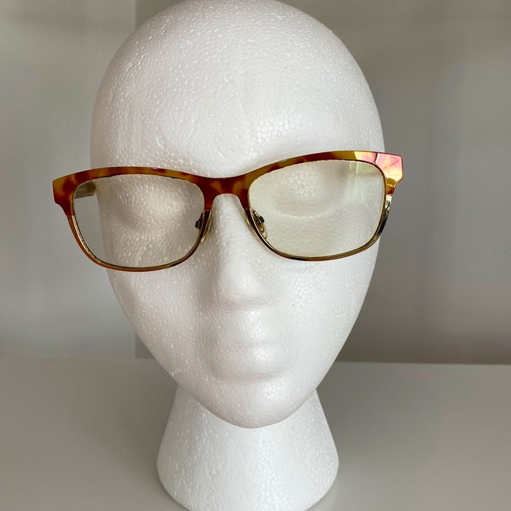 Gucci Tortoise/Gold Frame